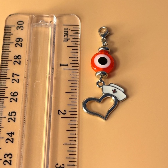 🧡🧿 Evil Eye Badge Reel Charm - Picture 2 of 3